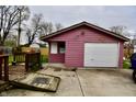 Detached garage providing ample space for vehicle storage and additional equipment at 7367 Parkside Dr, Indianapolis, IN 46226