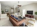 Comfortable living room showcasing stylish decor, a ceiling fan, and an open floor plan at 1238 Passage Way, Plainfield, IN 46168