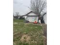 A functional shed provides extra storage space, located in backyard at 6206 W Us Highway 40, Stilesville, IN 46180