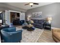 Comfortable living room with ample seating, neutral tones, and stylish decor for relaxation and gatherings at 11050 Midnight Pass, Fishers, IN 46037