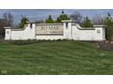 Community entrance sign for BO-MAR Estates, featuring a white stone wall and manicured lawn at 2721 Bo Street W, Plainfield, IN 46168