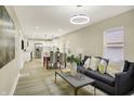 Open-concept living space, seamlessly integrating the living room, dining area, and a bright, modern kitchen at 2915 E 19Th St, Indianapolis, IN 46218