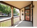 Inviting porch with classic railing, perfect for enjoying the outdoors and neighborhood views at 804 N California St, Indianapolis, IN 46202
