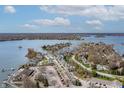Scenic aerial view of lakefront homes and surrounding neighborhood at 9769 Marina Village Dr, Indianapolis, IN 46256