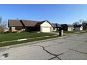 A quiet street view featuring well-maintained single Gathering homes at 1010 Pamela Dr, Plainfield, IN 46168