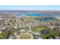 Stunning aerial view of a lakeside neighborhood with a mix of single-Gathering homes and waterfront access at 10611 Proposal Pointe Way, Fishers, IN 46040