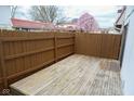 Wooden deck with a wooden fence around it, perfect for outdoor relaxation and entertainment at 2862 Punto Alto Ct, Indianapolis, IN 46227