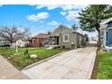 Lovely home featuring well-kept lawn and private, paved driveway at 4721 Ralston Ave, Indianapolis, IN 46205