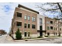 Beautiful exterior view of the building showing the professionally landscaped entryway at 504 N Park Ave # 3, Indianapolis, IN 46202
