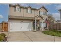 Charming two-story home with an attached garage, manicured lawn, and pleasing curb appeal at 768 Pine Lake Dr, Greenwood, IN 46143