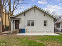 Backyard with a small patio, steps up to the back door, and space for outdoor enjoyment at 270 W Broadway St, Shelbyville, IN 46176