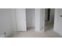 Hallway in unfinished home with fresh white paint and baseboards at 3941 Highcrest Rd, Indianapolis, IN 46239