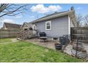 Spacious backyard with a patio area perfect for entertaining and outdoor activities at 4815 Winthrop Ave, Indianapolis, IN 46205