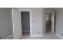 View of a bedroom featuring painted walls, white trim and two open doorways to other rooms at 4952 Cinnabar Trl, Brownsburg, IN 46112