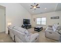 Cozy living room with plush seating, vaulted ceilings and ample natural light at 6535 Heben Ct, Indianapolis, IN 46113