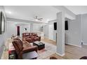 Finished basement includes updated flooring, a wet bar, and ample seating at 6869 W Winding, McCordsville, IN 46055