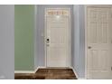 A simple entryway with painted walls and a white front door at 701 Downing Dr, Greenwood, IN 46143