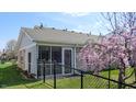 This home features a fenced backyard, providing a private outdoor space for relaxation and enjoyment at 8142 Bentley Farms Dr, Indianapolis, IN 46259