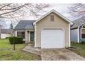 Inviting single-story home boasting a tidy facade and an attached single car garage at 9223 Steeplechase Dr, Indianapolis, IN 46250