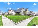 Charming home featuring stone accents, a manicured lawn, and a beautiful yard at 524 N Meridian St, Lebanon, IN 46052