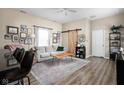 Cozy living room with ample seating, a decorative rug, and plenty of natural light at 1429 Linden St, Indianapolis, IN 46203