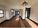 Empty living room featuring hardwood floors and white walls at 2338 N Harding St, Indianapolis, IN 46208