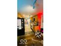 Compact kitchen with wooden cabinets and essential appliances at 2804 Paso Del Norte Dr, Indianapolis, IN 46227
