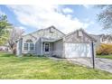 Attractive home featuring an attached two-car garage, landscaping, and a well-kept yard at 726 Westridge S Dr, Noblesville, IN 46062