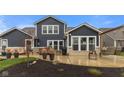 Enjoy outdoor living with a spacious patio, lush lawn, and landscaped beds with fresh mulch at 11450 Wicker Ln, Noblesville, IN 46060