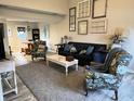 Cozy living room featuring a comfortable sofa, stylish decor, and an open layout, perfect for relaxation at 1198 Paradise N Way # C, Greenwood, IN 46143