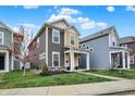 A beautiful exterior view of a two-story home with manicured lawn and sidewalk at 146 Handley St, Indianapolis, IN 46222
