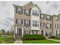 Attractive brick townhome with inviting front garden area at 170 Straughn Ln, Westfield, IN 46074