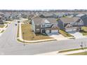 An aerial view of a neighborhood showcasing the home's location in a suburban community at 3999 Kensington Dr, Danville, IN 46122