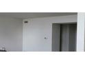 Bright and empty room with fresh white paint, awaiting your personal touch at 4063 Orchard Valley Blvd, Indianapolis, IN 46235
