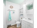 Classic white bathroom features beadboard paneling and nautical-themed decorations at 7591 Inkbush Dr, Nineveh, IN 46164