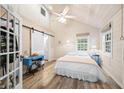 Cozy bedroom with a vintage Singer sewing table and lots of natural light at 7591 Inkbush Dr, Nineveh, IN 46164