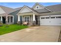 Charming home featuring a cozy front porch with a decorative sitting bench at 8160 Nik St, Brownsburg, IN 46112