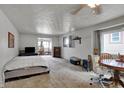 Cozy bedroom with neutral colors and plenty of natural light at 947 E Bradbury Ave, Indianapolis, IN 46203