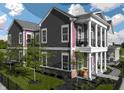 Charming multi-Gathering building with distinct exterior colors and stately white columns at 998 Kinzer Ave, Carmel, IN 46032
