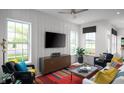 Stylish living room with ample natural light, modern furniture, and neutral tones at 998 Kinzer Ave, Carmel, IN 46032