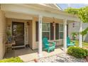 Charming front porch with inviting decor and cozy seating for relaxing and enjoying the neighborhood views at 12722 Brady Ln, Noblesville, IN 46060