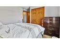 Inviting bedroom with wood furnishings, plush carpeting, and ample closet space at 760 Sable Ridge Dr, Greenwood, IN 46142