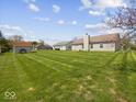 Spacious backyard with lush green grass, perfect for outdoor activities and relaxation at 1321 Savannah Blvd, Shelbyville, IN 46176