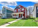 Beautiful two-story home featuring a welcoming front yard and charming curb appeal at 2018 Cornell Ave, Indianapolis, IN 46202