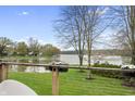 Beautiful backyard view of the lake at 4561 Coles Dr, Columbus, IN 47201