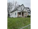 Shot of the exterior of a two story home, with a small front porch at 630 Congress Ave, Indianapolis, IN 46208
