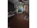 Shot of the living room, which needs some decluttering, and tidying at 630 Congress Ave, Indianapolis, IN 46208