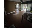 A view of the living room, which needs a bit of cleaning and tidying at 630 Congress Ave, Indianapolis, IN 46208