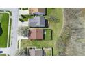 Aerial view of a single Gathering home with a well-maintained lawn and fenced yard at 10876 Bellflower Ct, Indianapolis, IN 46235