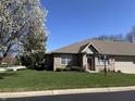 Well-maintained single-Gathering home with a manicured lawn and mature landscaping under a sunny sky at 18346 Piers End Dr, Noblesville, IN 46062